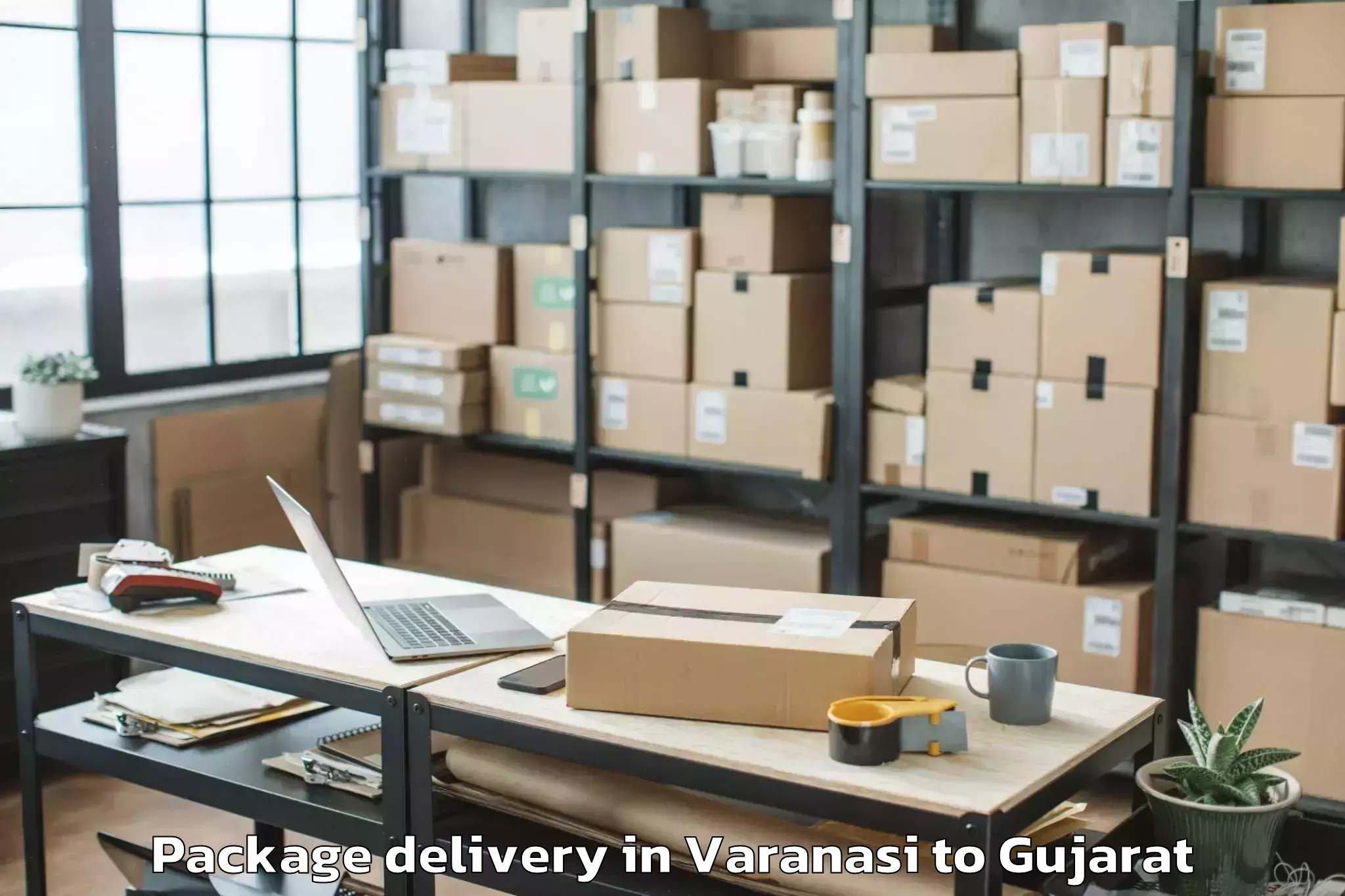 Book Varanasi to Vaghodia Ina Package Delivery Online